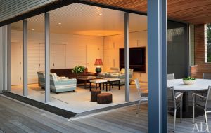 A geometric Hamptons house by Leroy Street Studio and decorator Thad Hayes Design-cabana-room.jpg